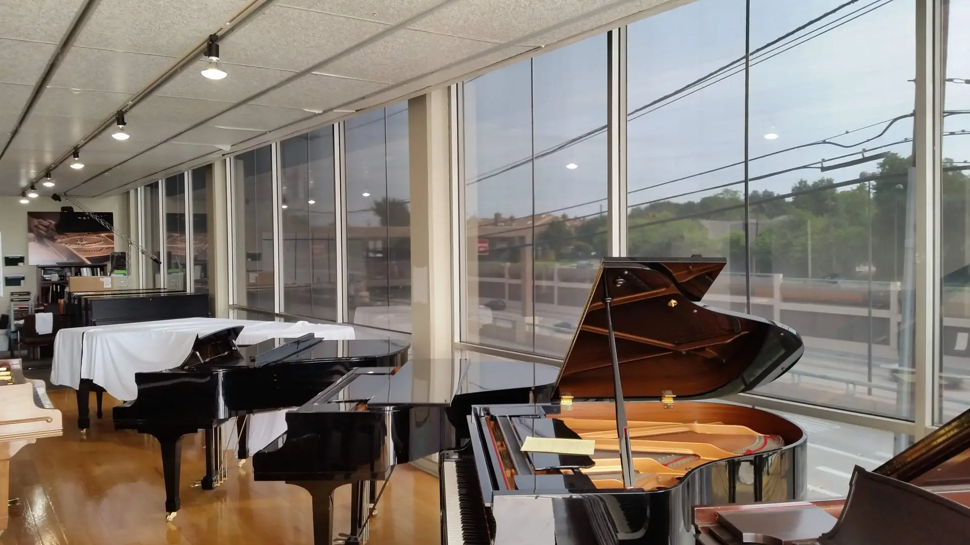 Steinway Hall piano showroom full glass wall solar film DFW