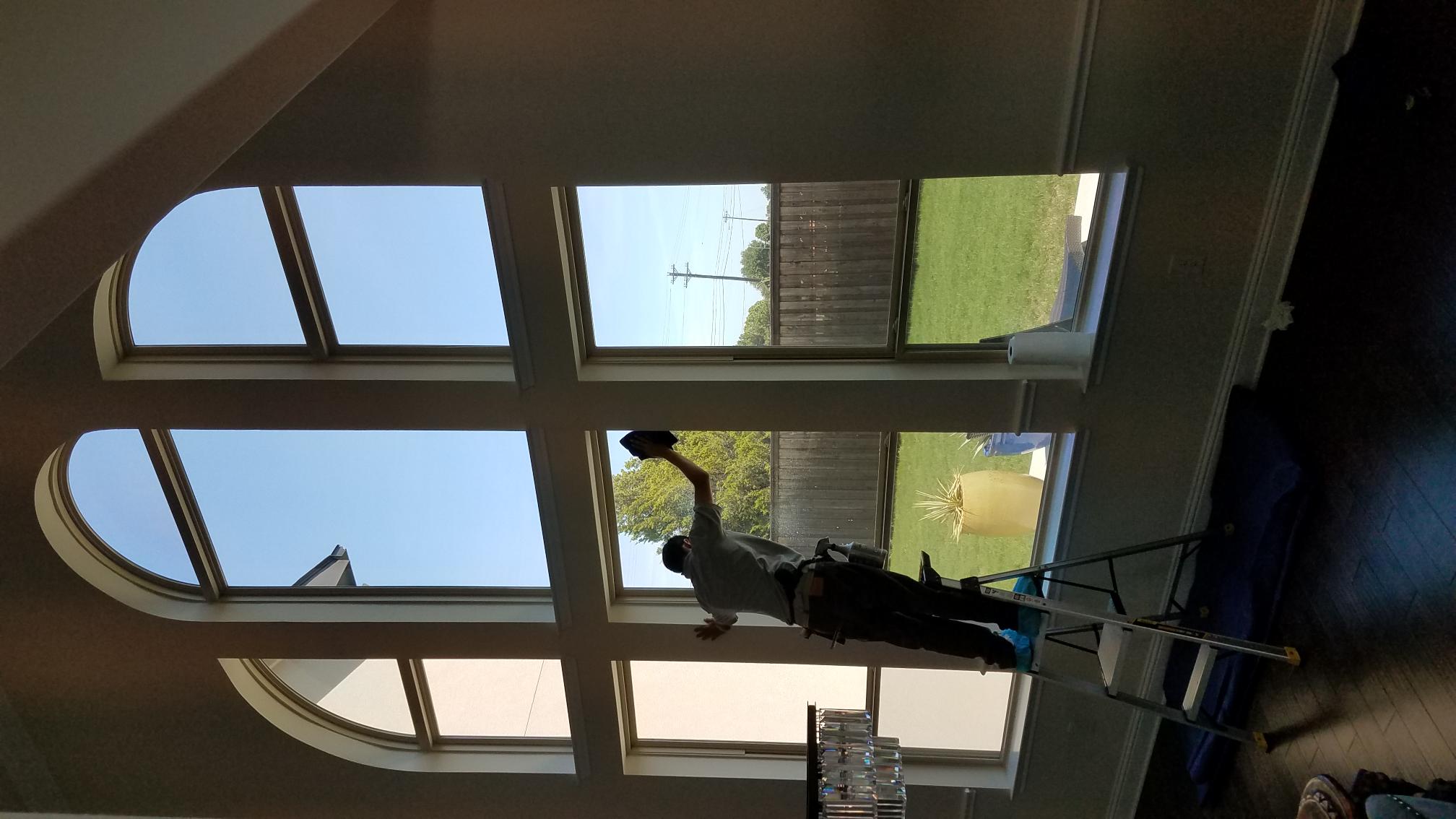Restaurant interior with floor-to-ceiling windows and solar film