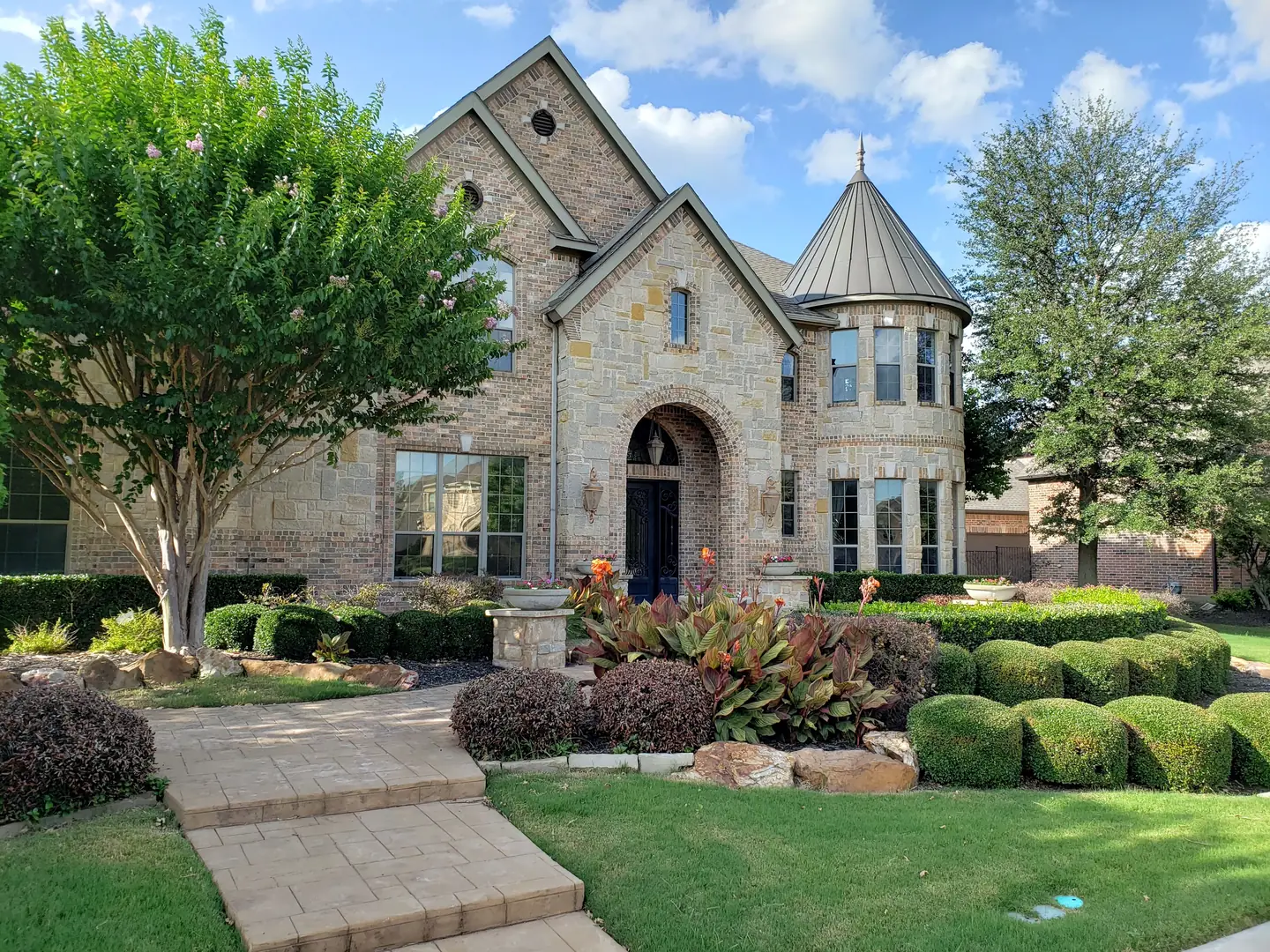 French chateau brick stone home dark window film DFW