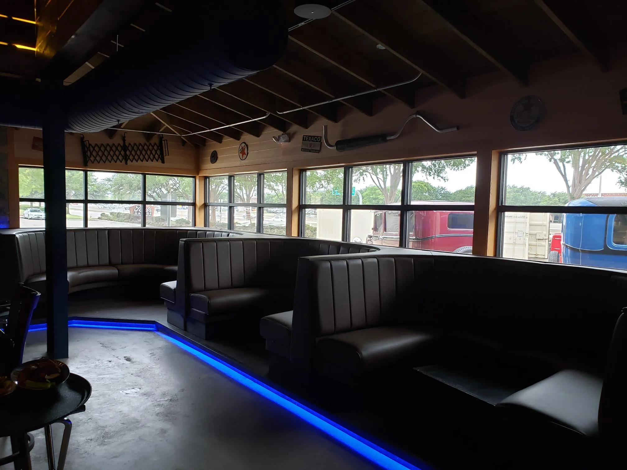Ford's Garage restaurant booth seating curved windows ceramic solar film DFW