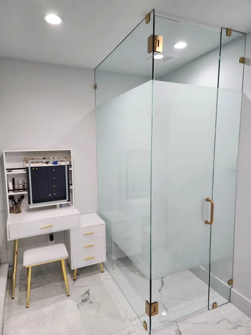 Frosted shower enclosure luxury bathroom gold hardware marble