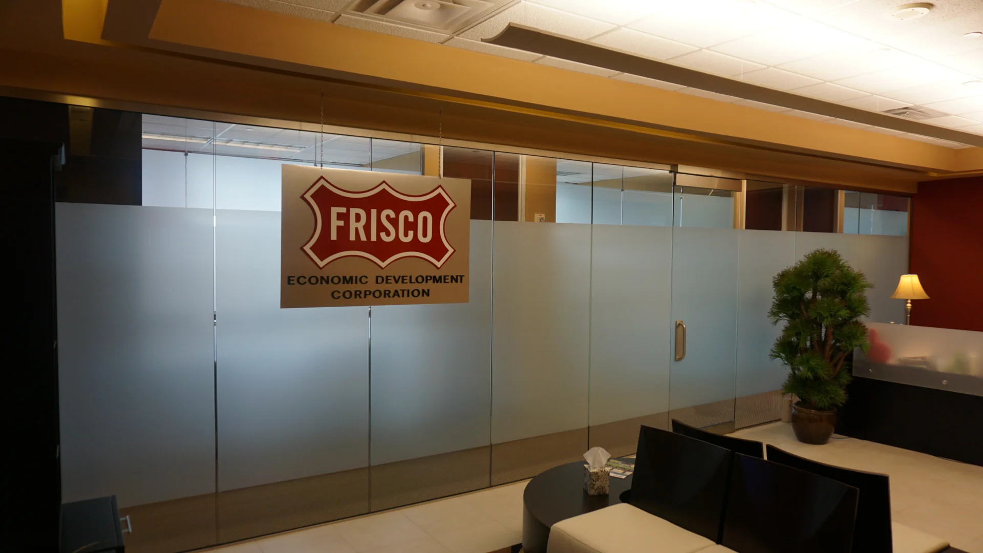 Frisco Economic Development Corporation frosted glass branded logo