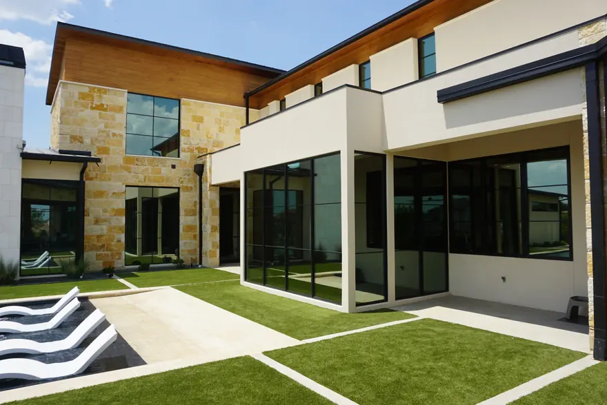 Dual-reflective window film on a Westlake home